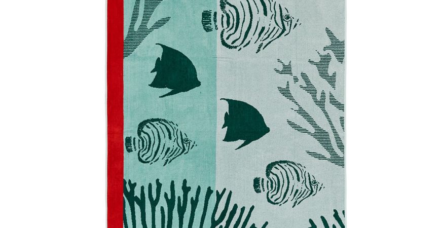 Draps de plage brodés : l’élégance premium signée Label Broderie